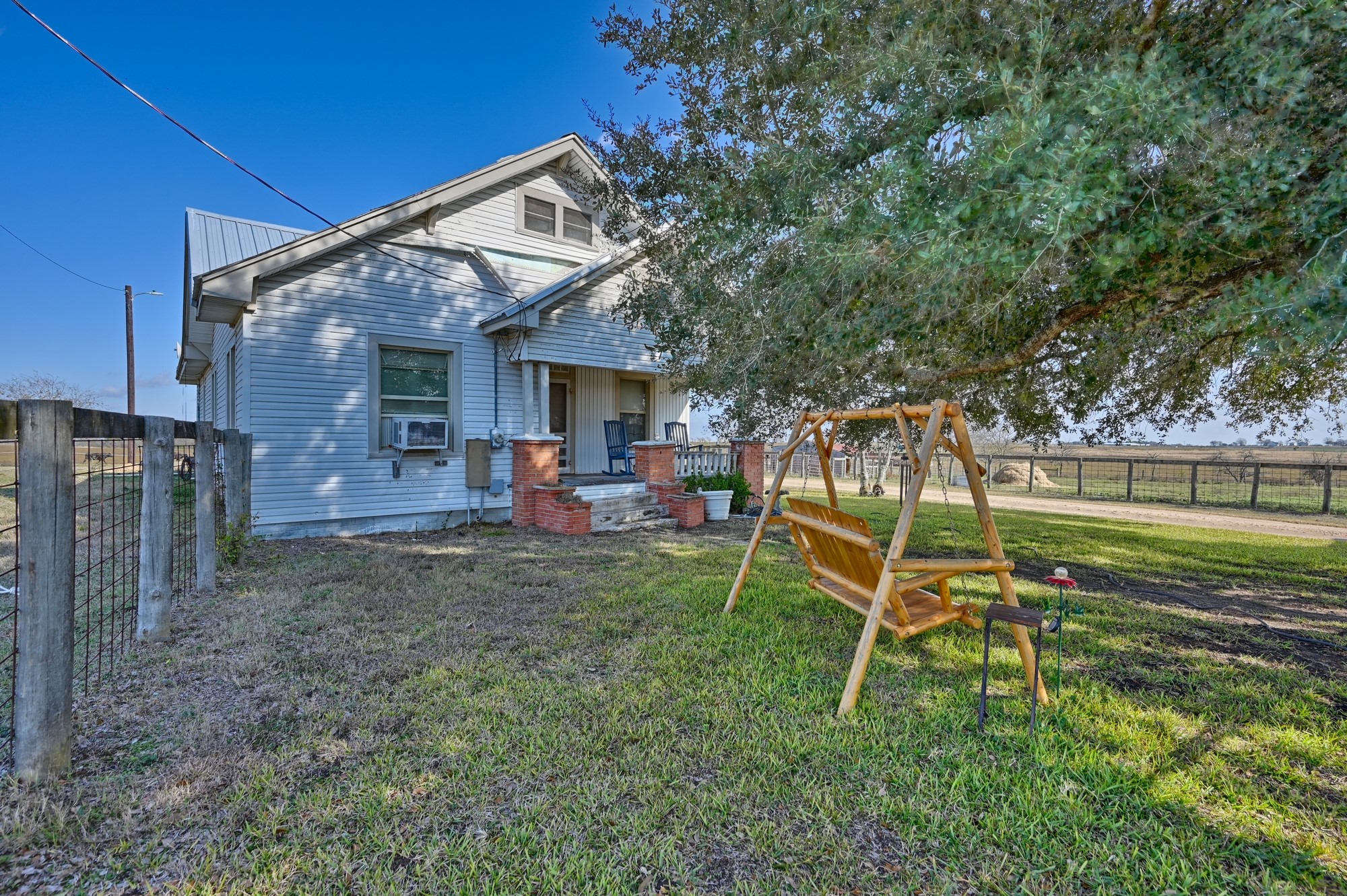 4898 FM 2502 Road Bleiblerville, TX 78931 - Photo 7 of 15 a view of a house with backyard and sitting area