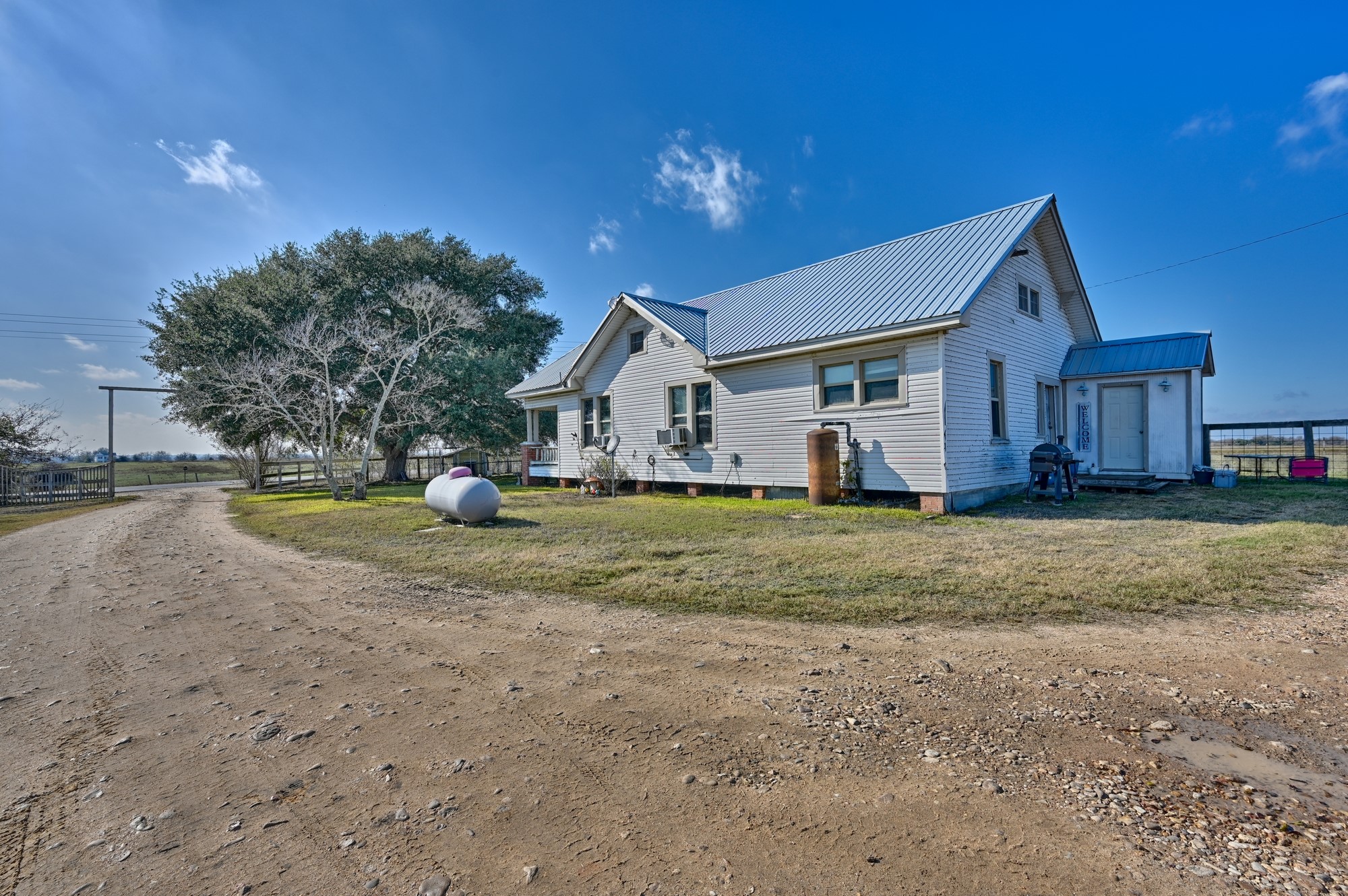 4898 FM 2502 Road Bleiblerville, TX 78931 - Photo 8 of 15 a view of house with backyard and tree