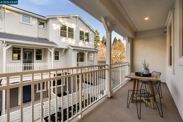 a bedroom with bed and a window