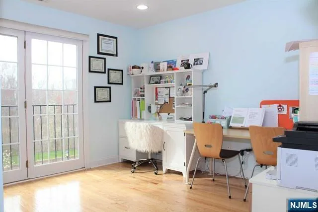 a bedroom with bed and a window