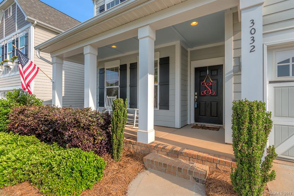 3032 Fallondale Road Waxhaw, NC 28173 - Photo 2 of 23 a front view of a house with garden