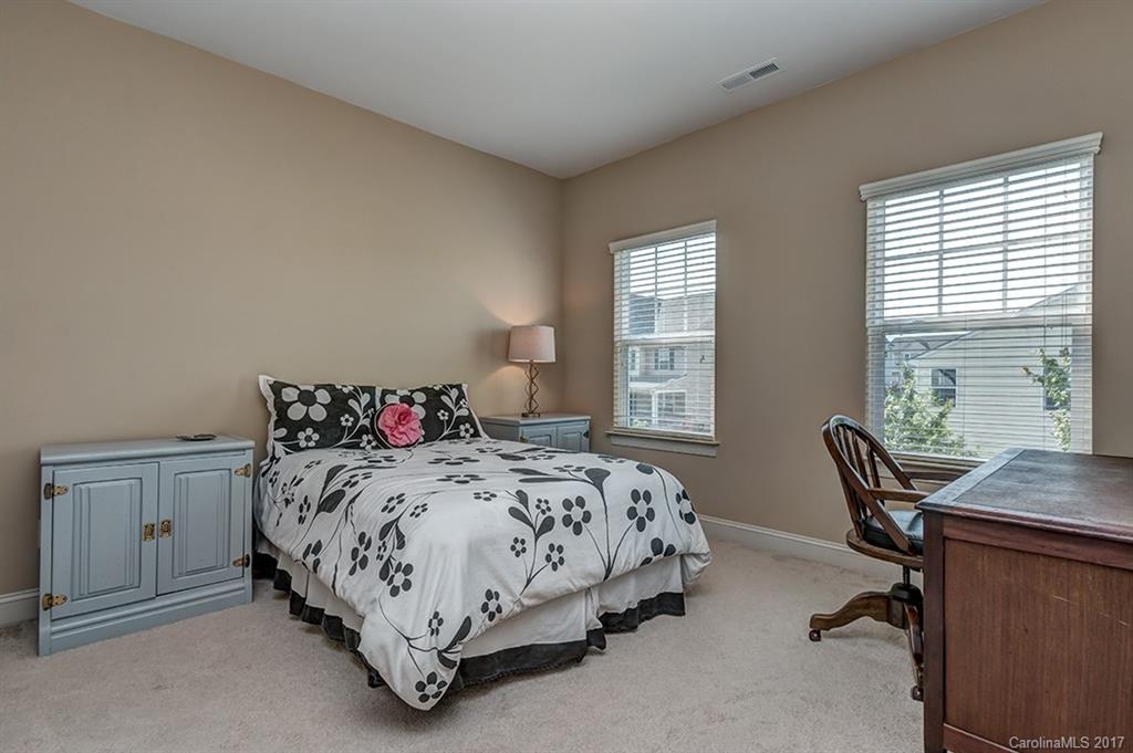 3032 Fallondale Road Waxhaw, NC 28173 - Photo 14 of 23 a bedroom with a bed chair and a window