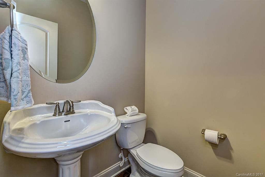 3032 Fallondale Road Waxhaw, NC 28173 - Photo 5 of 23 a bathroom with a sink and a mirror