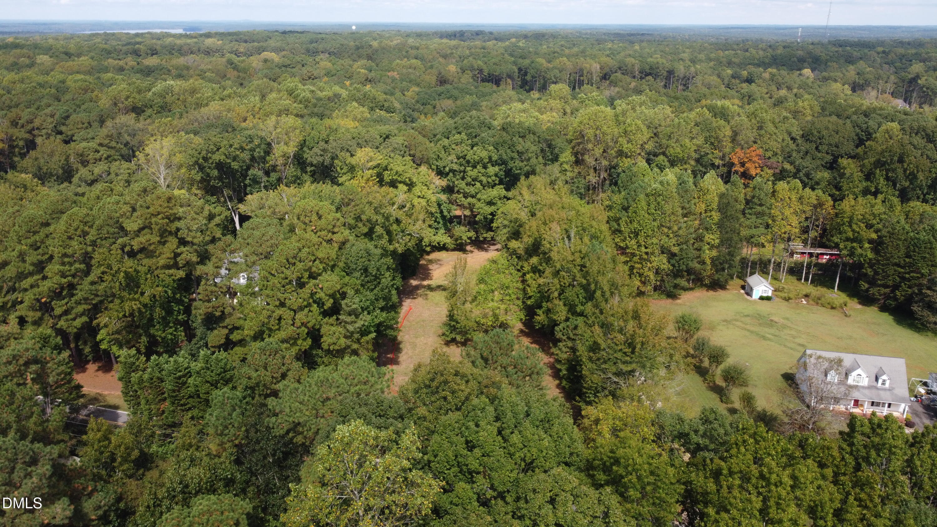 3028 Mt Vernon Church Road Raleigh, NC 27613 - Photo 9 of 13 an aerial view of residential houses with outdoor space and trees