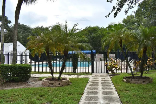 a view of swimming pool with chairs