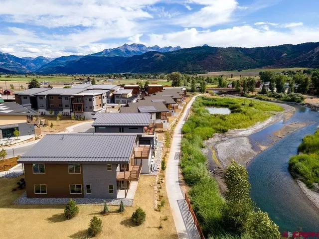 a view of a house with a swimming pool
