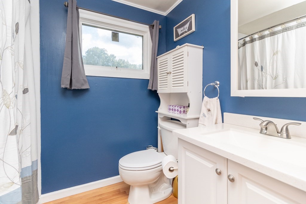 206 Pine Acre Road Springfield, MA 01129 - Photo 13 of 25 a bathroom with a sink toilet and a window