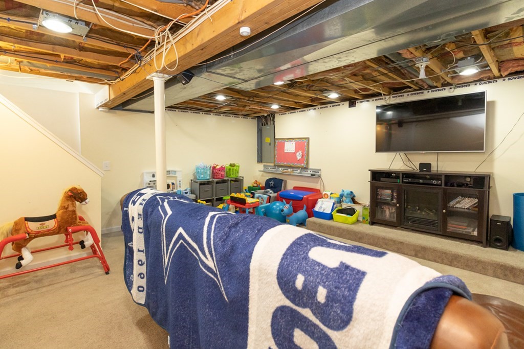 206 Pine Acre Road Springfield, MA 01129 - Photo 20 of 25 a bed room with furniture and a flat screen tv