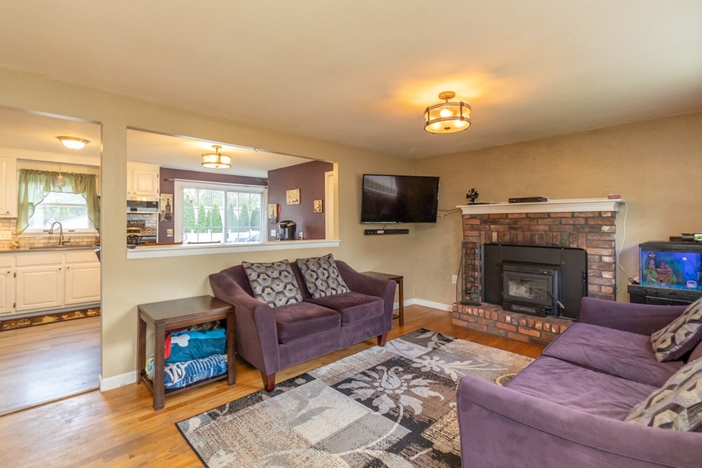 206 Pine Acre Road Springfield, MA 01129 - Photo 4 of 25 a living room with furniture and a fireplace