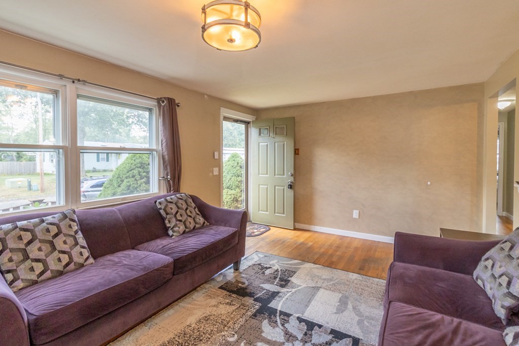 206 Pine Acre Road Springfield, MA 01129 - Photo 6 of 25 a living room with furniture and a large window