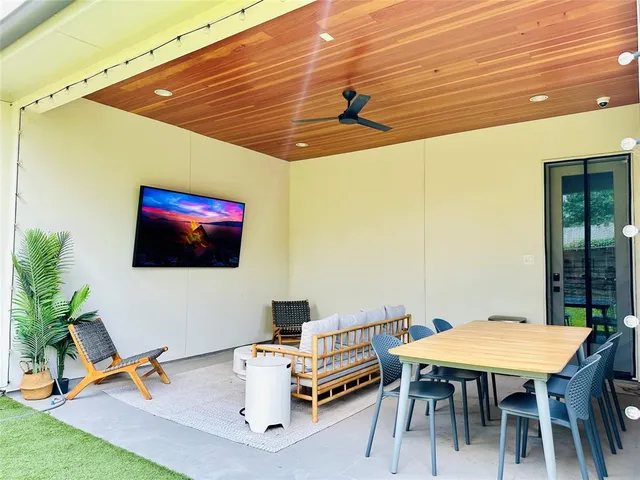 a view of a bathroom with a bathtub