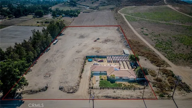 a view of a lake with beach and city view