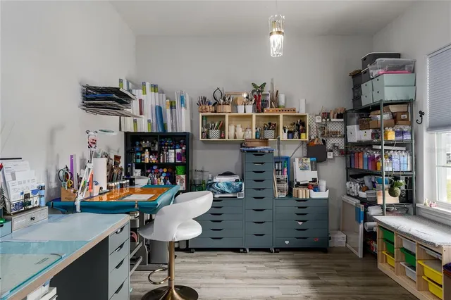 a room with lots of furniture and clutter