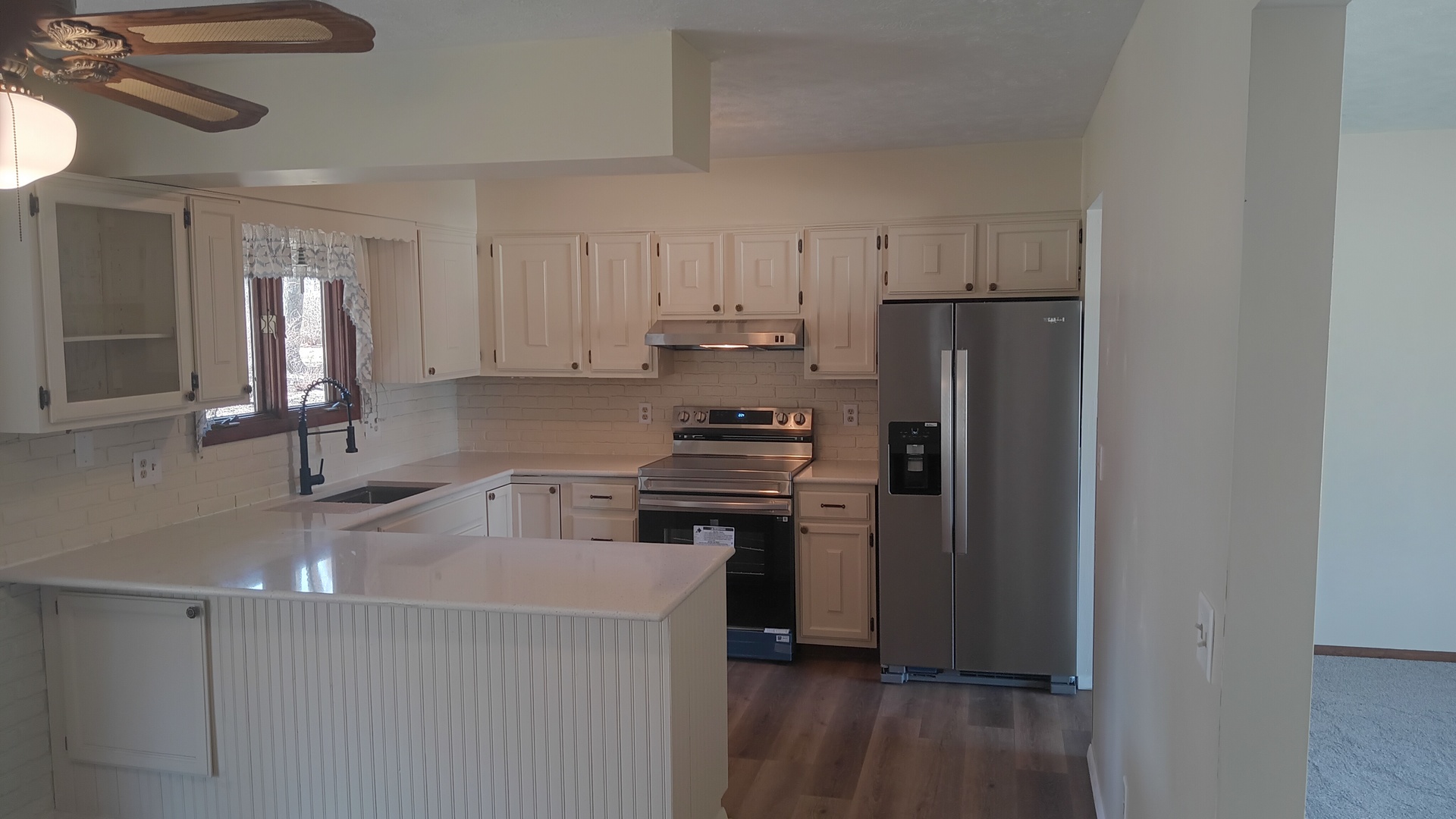 1633 Erin Drive Normal, IL 61761 - Photo 11 of 46 a kitchen with a refrigerator and a sink