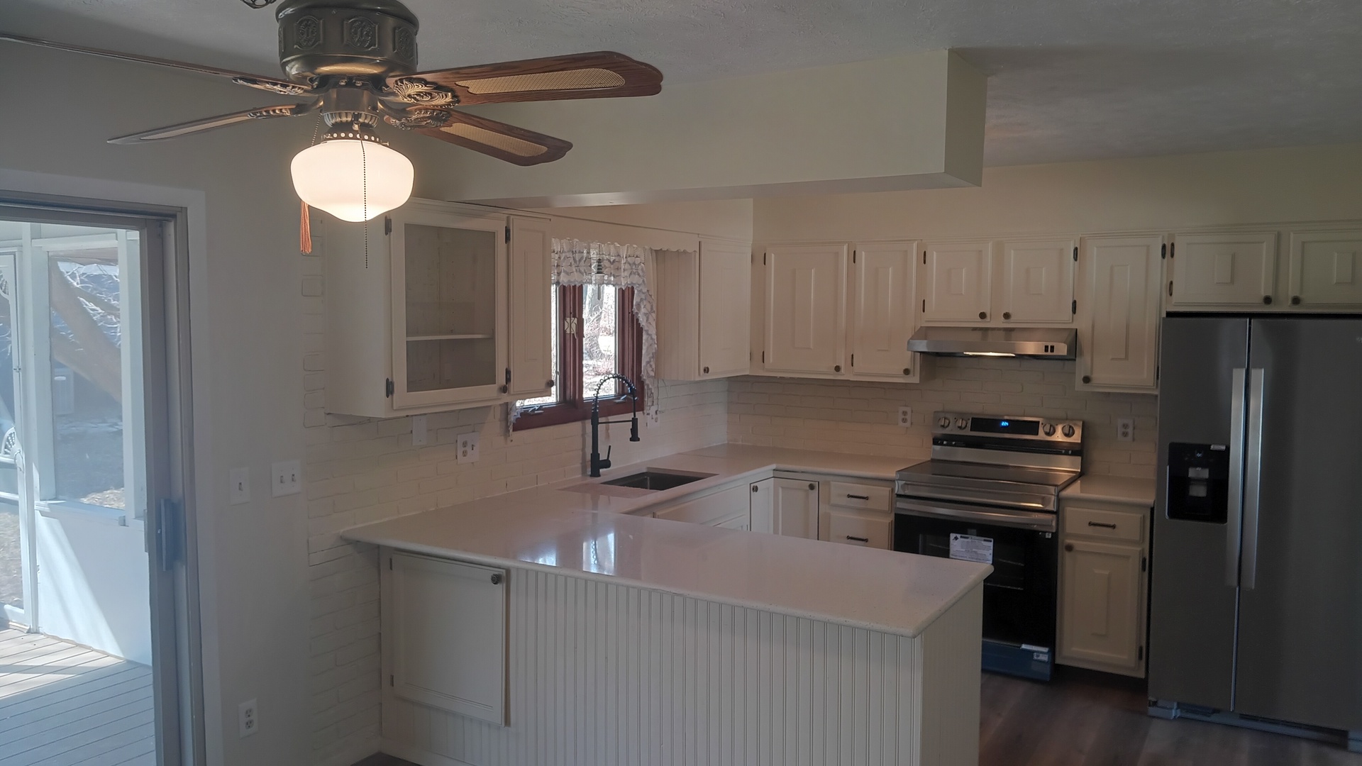 1633 Erin Drive Normal, IL 61761 - Photo 12 of 46 a kitchen with refrigerator and window