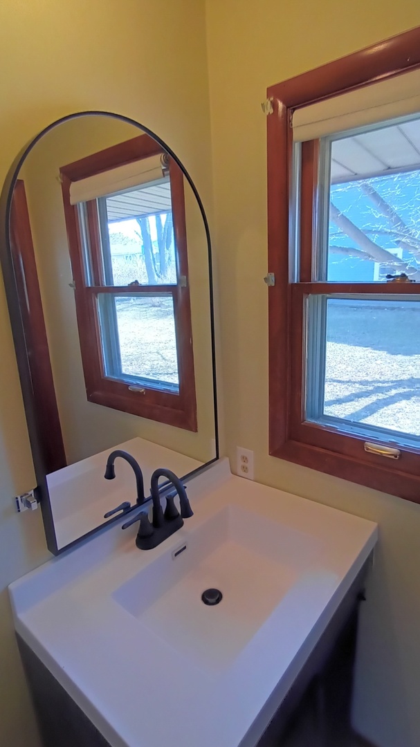 1633 Erin Drive Normal, IL 61761 - Photo 17 of 46 a room with a table chairs and windows