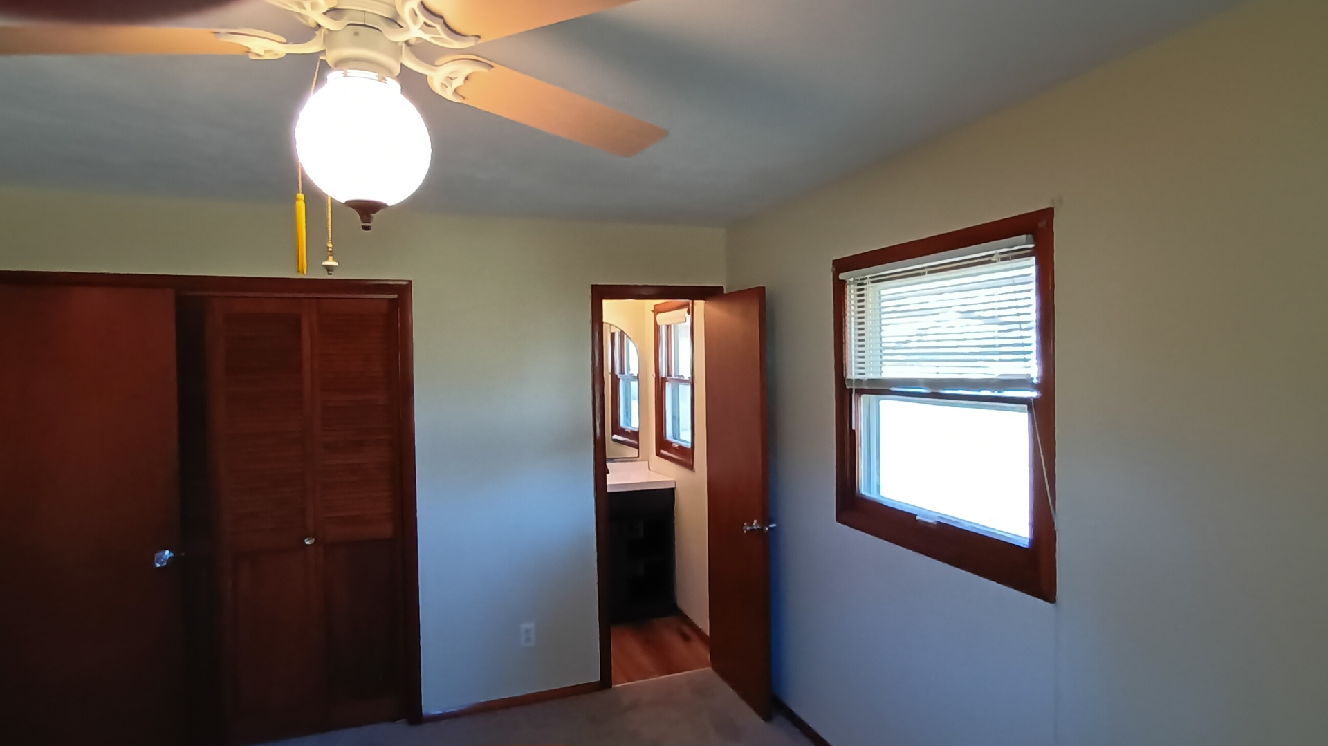 1633 Erin Drive Normal, IL 61761 - Photo 18 of 46 a view of a hallway with windows and chandelier