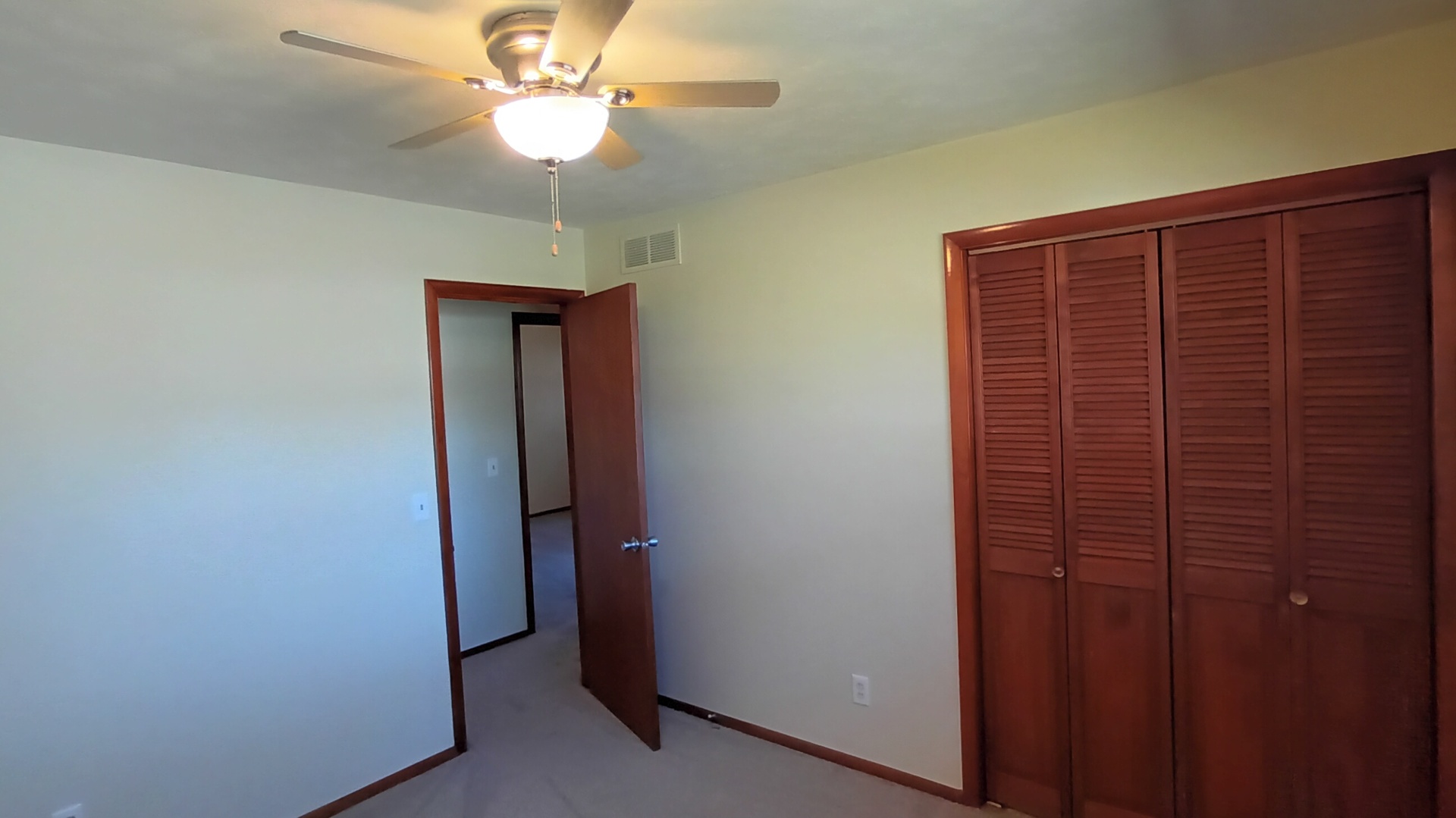 1633 Erin Drive Normal, IL 61761 - Photo 19 of 46 a view of hallway with chandelier fan