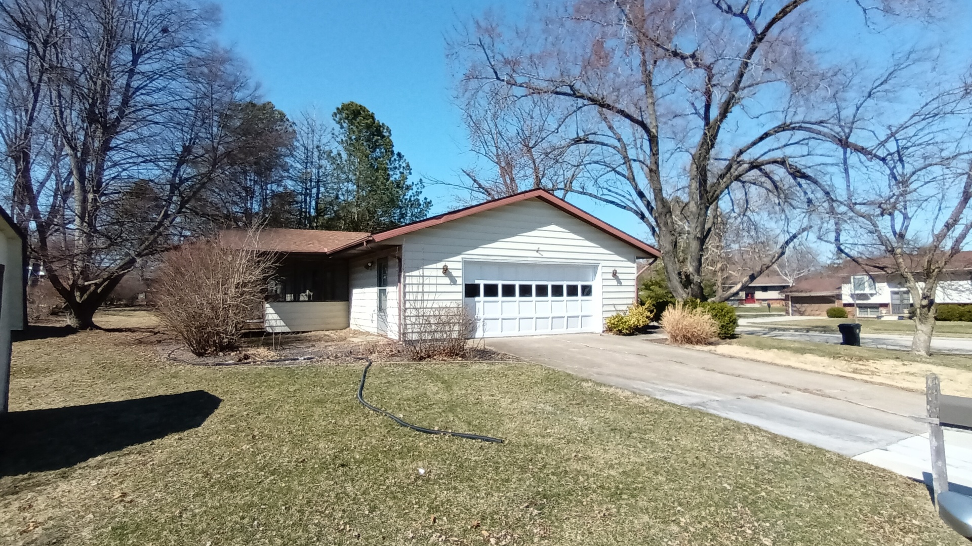1633 Erin Drive Normal, IL 61761 - Photo 4 of 46 a front view of a house with a yard