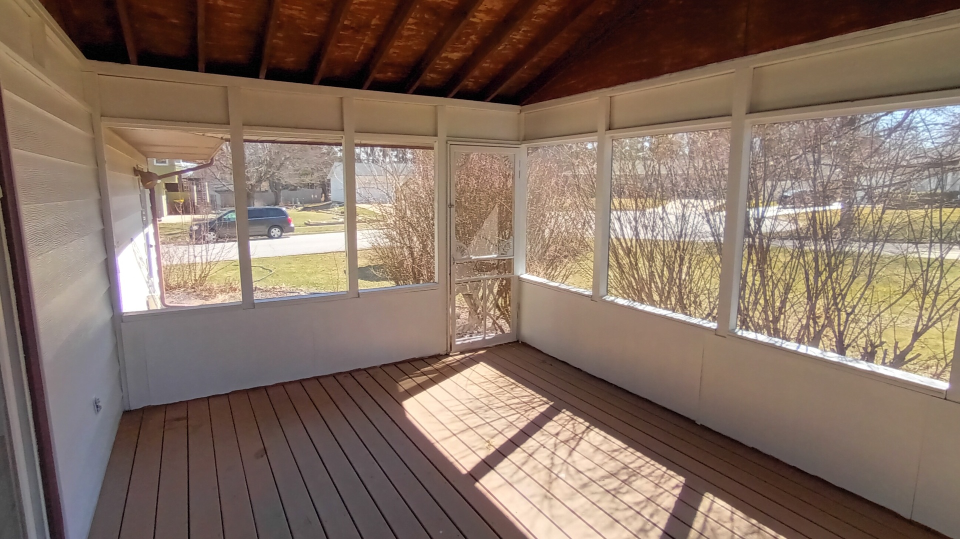 1633 Erin Drive Normal, IL 61761 - Photo 41 of 46 a view of an empty room with wooden floor and a window