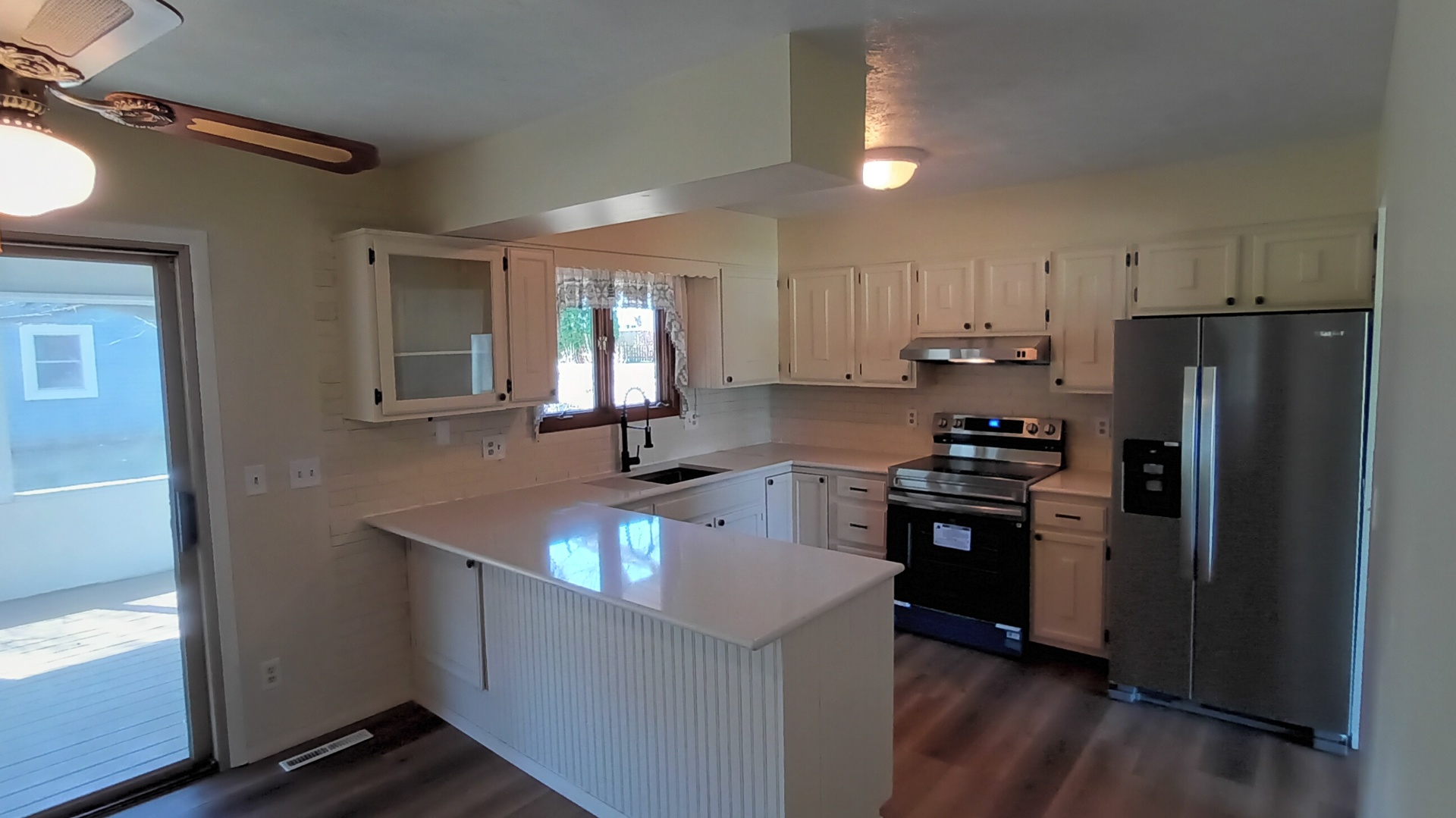 1633 Erin Drive Normal, IL 61761 - Photo 7 of 46 a kitchen with kitchen island granite countertop a refrigerator stove and sink