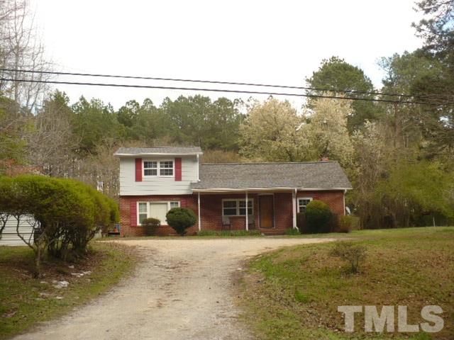 1311 Bethel Road Raleigh, NC 27610 - Photo 1 of 24 a front view of a house with a yard