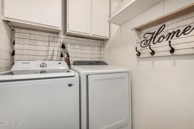 a view of a backyard with a garden and deck