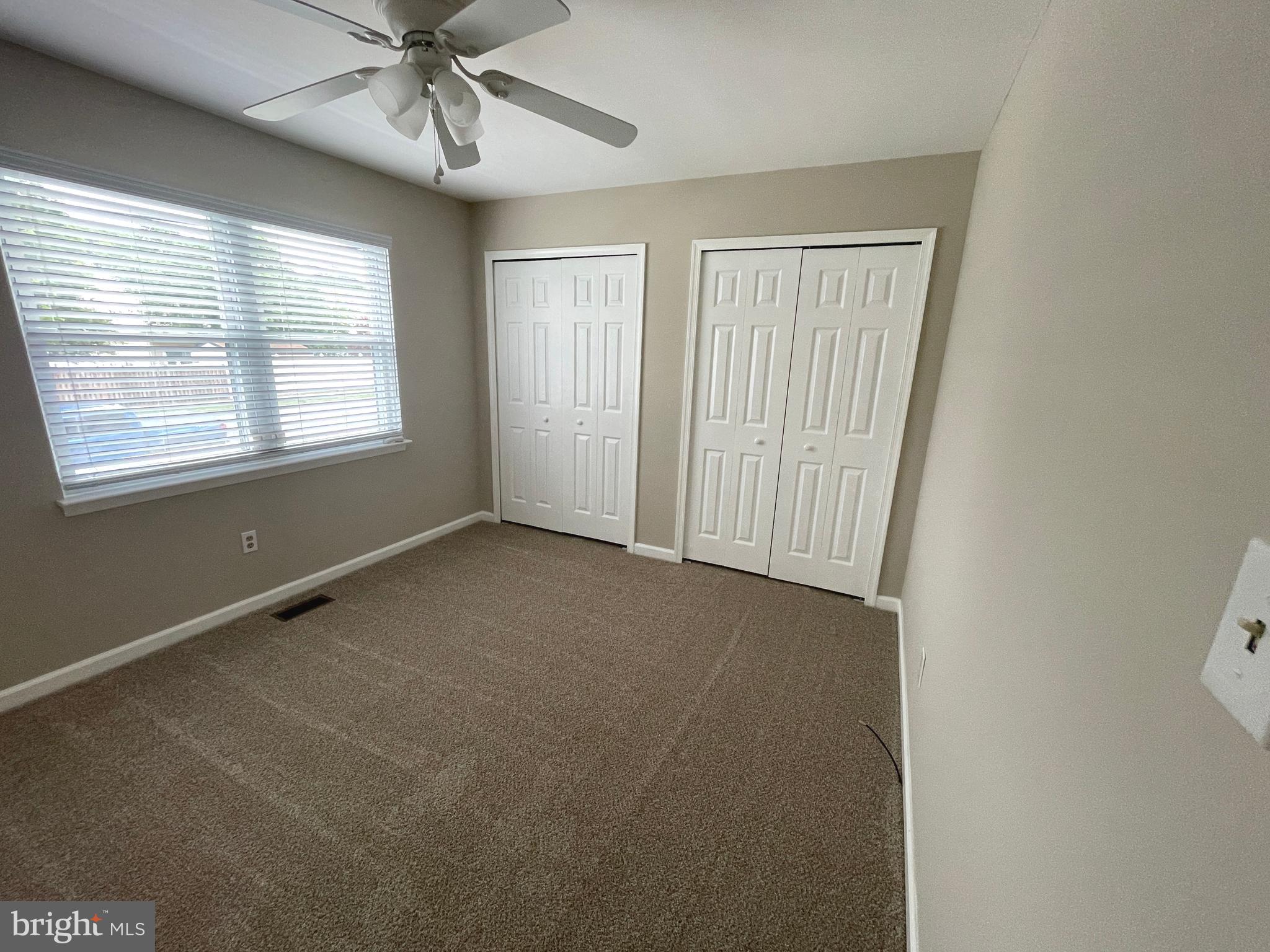 7944 Tick Neck Road Pasadena, MD 21122 - Photo 22 of 40 a view of an empty room with a window