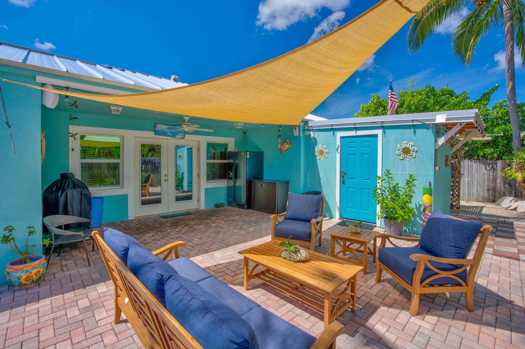 321 3rd Road Key Largo, FL 33037 - Photo 14 of 45 a view of an house with backyard porch and furniture