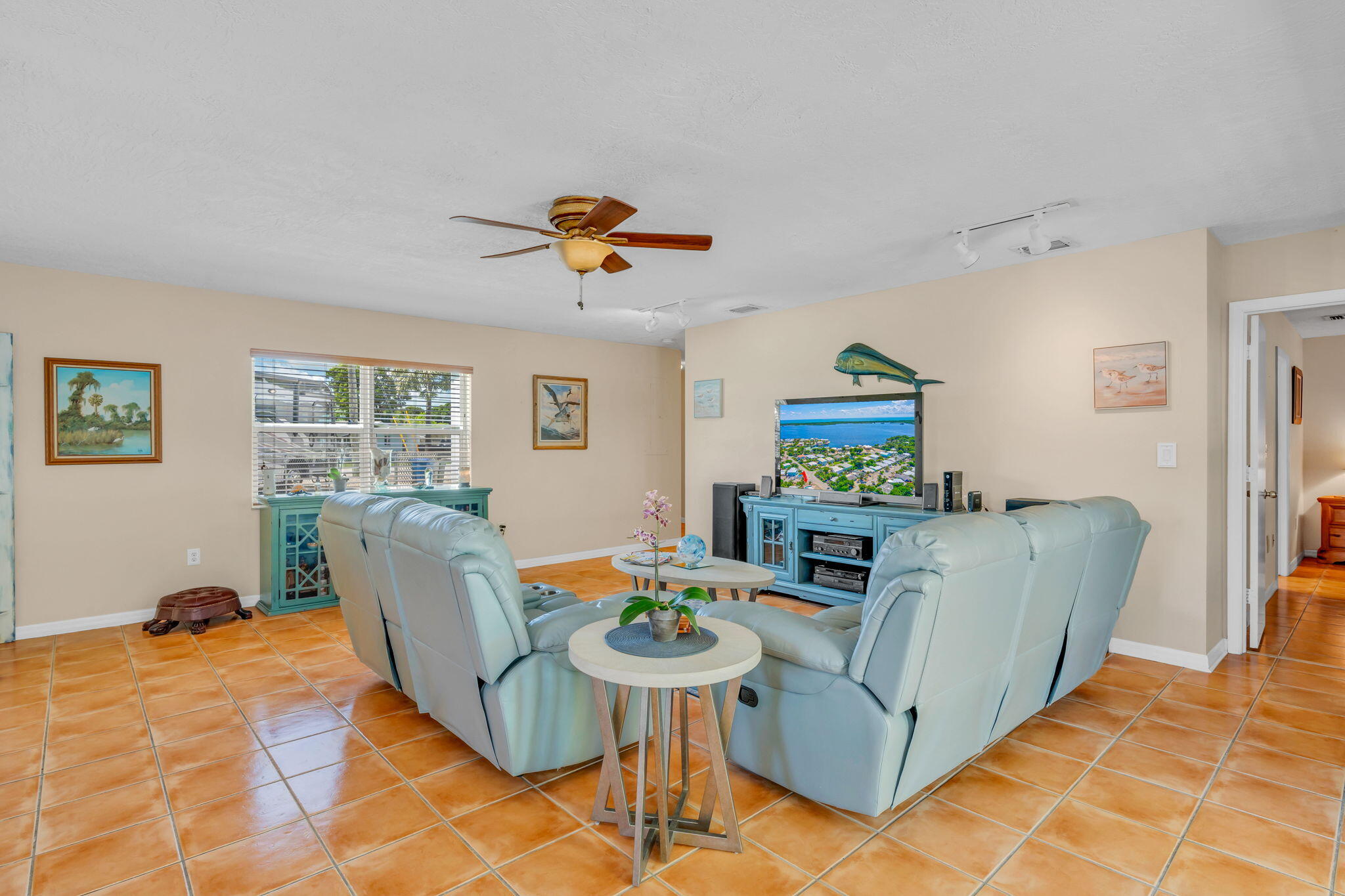 321 3rd Road Key Largo, FL 33037 - Photo 23 of 45 a living room with furniture and a flat screen tv