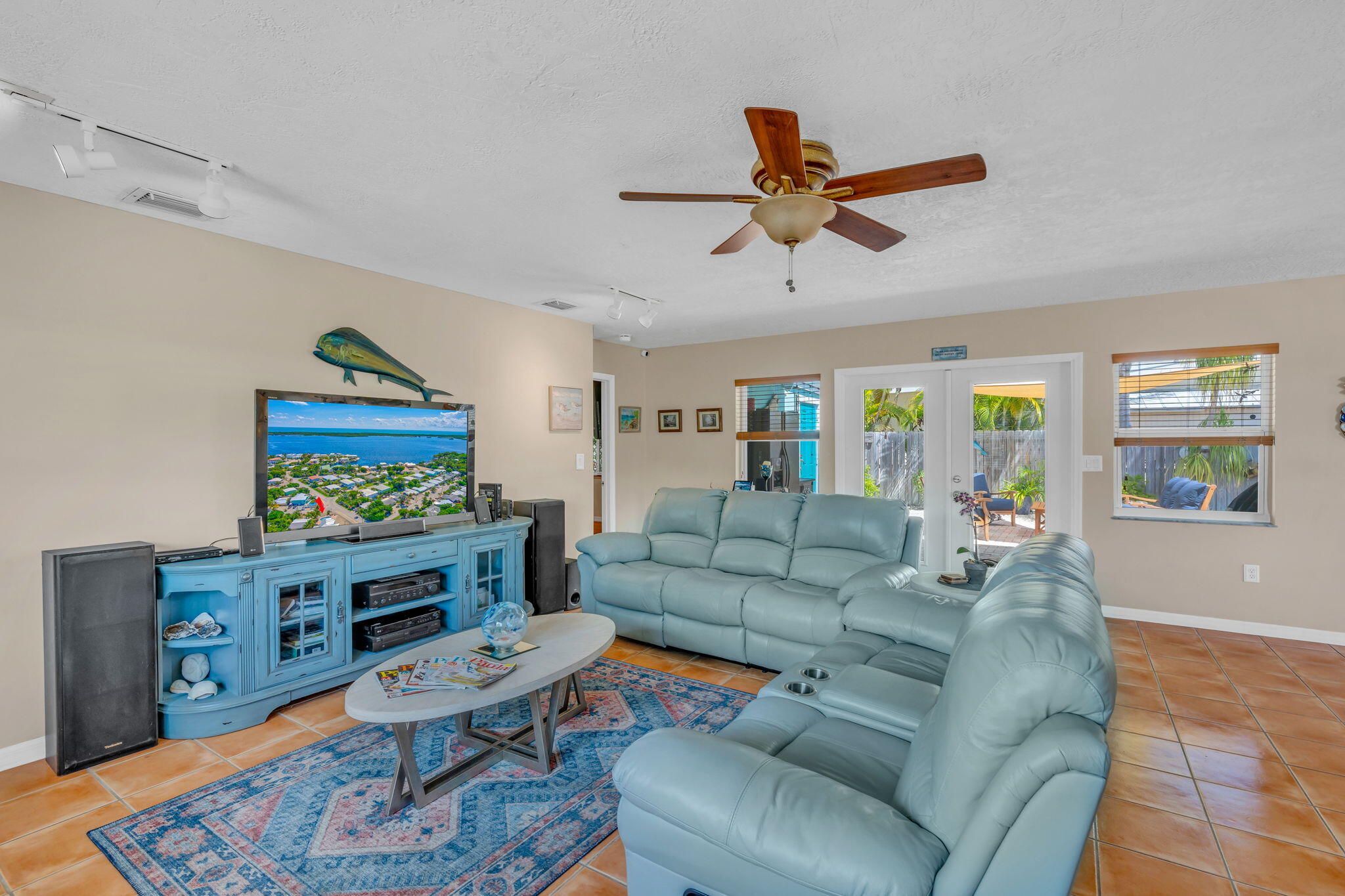 321 3rd Road Key Largo, FL 33037 - Photo 25 of 45 a living room with furniture and a window