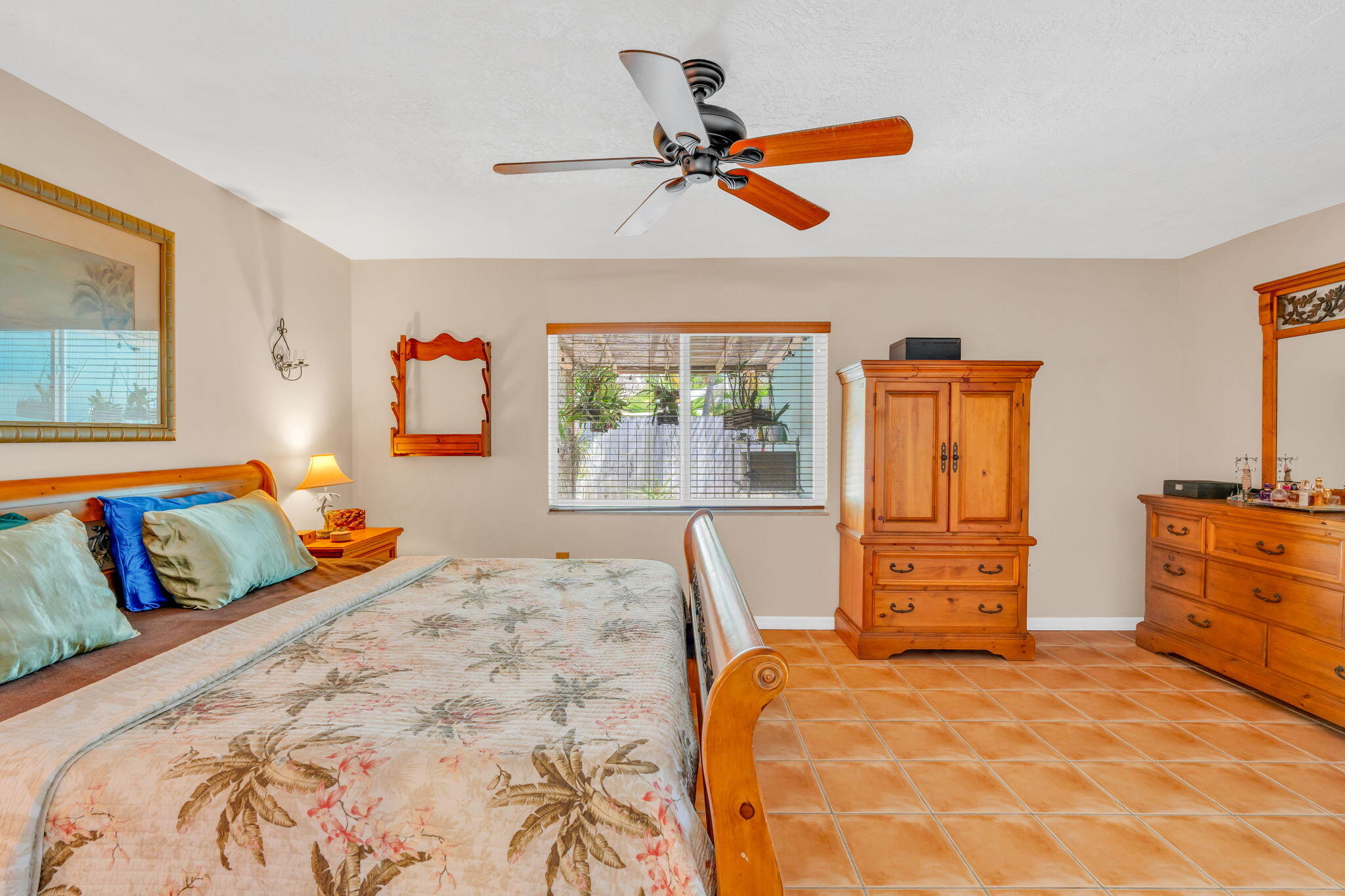 321 3rd Road Key Largo, FL 33037 - Photo 29 of 45 a bedroom with a bed and wooden floor