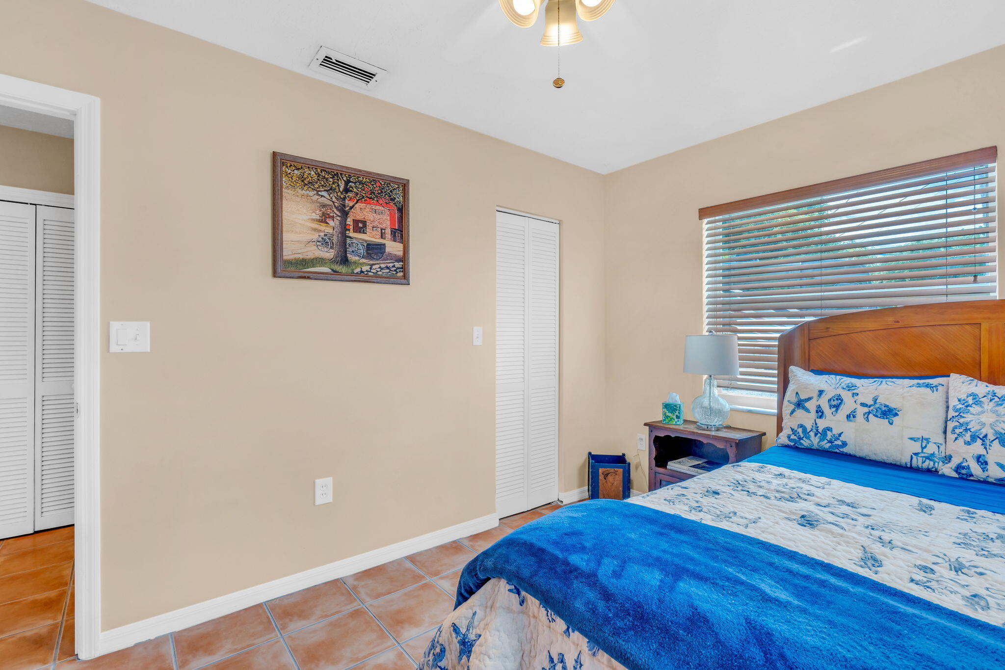 321 3rd Road Key Largo, FL 33037 - Photo 38 of 45 a bedroom with a bed and a window