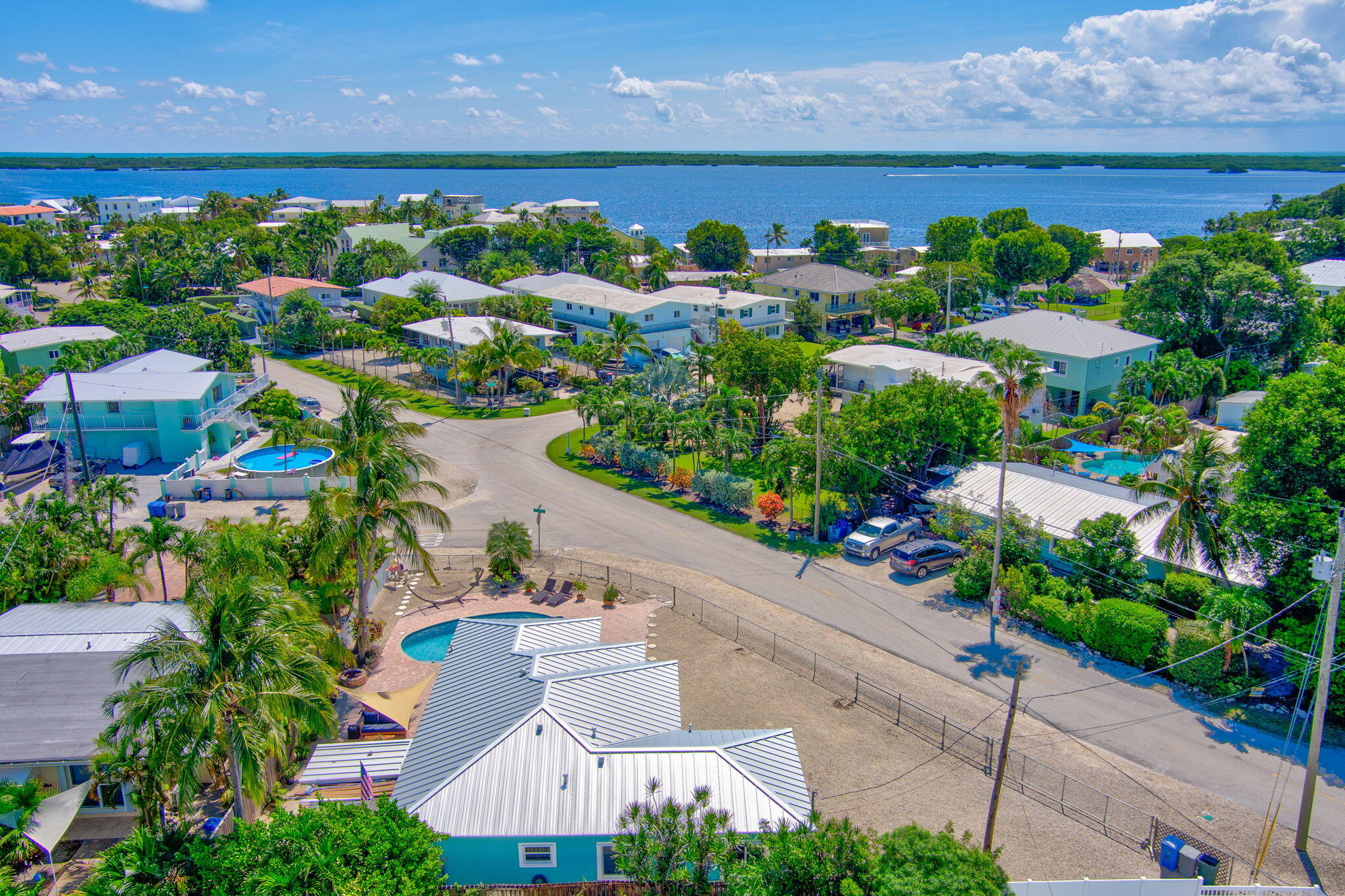 321 3rd Road Key Largo, FL 33037 - Photo 41 of 45 an aerial view of a house with a yard and garden