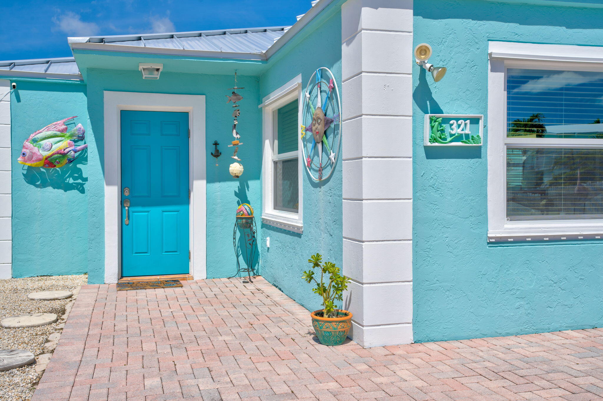 321 3rd Road Key Largo, FL 33037 - Photo 5 of 45 a house view with a backyard space