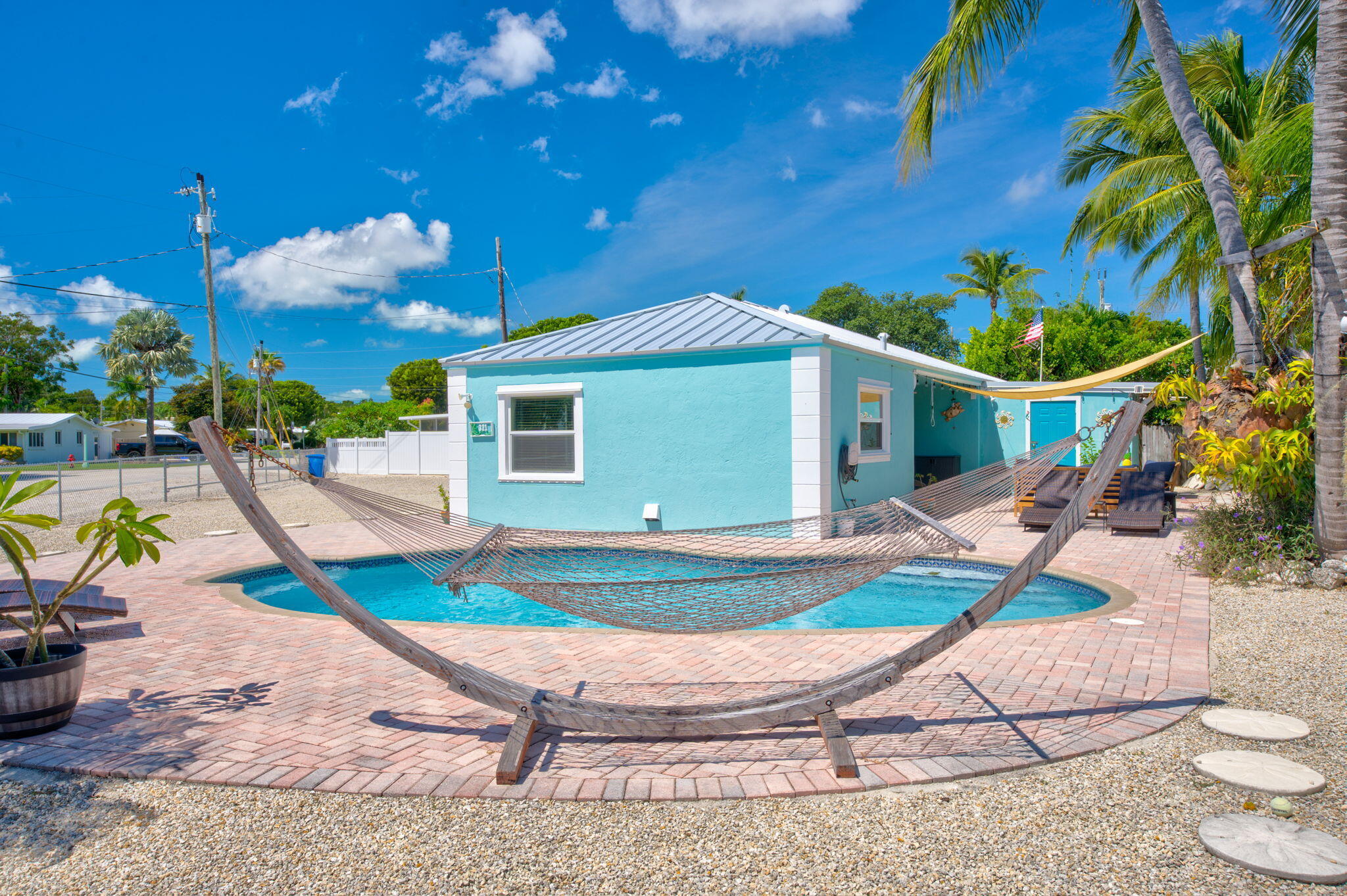 321 3rd Road Key Largo, FL 33037 - Photo 6 of 45 a view of a house with backyard porch and sitting area