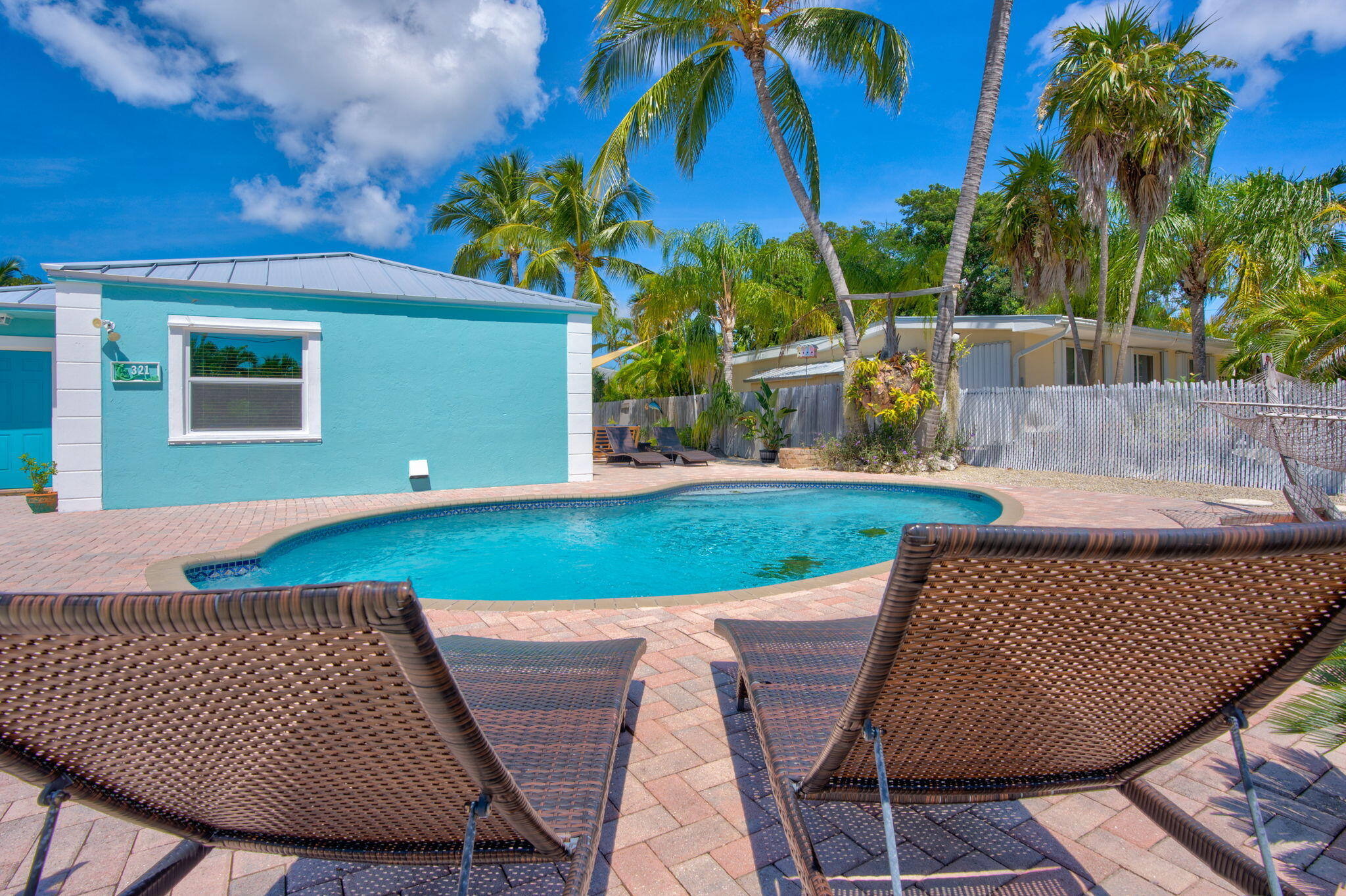 321 3rd Road Key Largo, FL 33037 - Photo 7 of 45 an outdoor sitting area with furniture