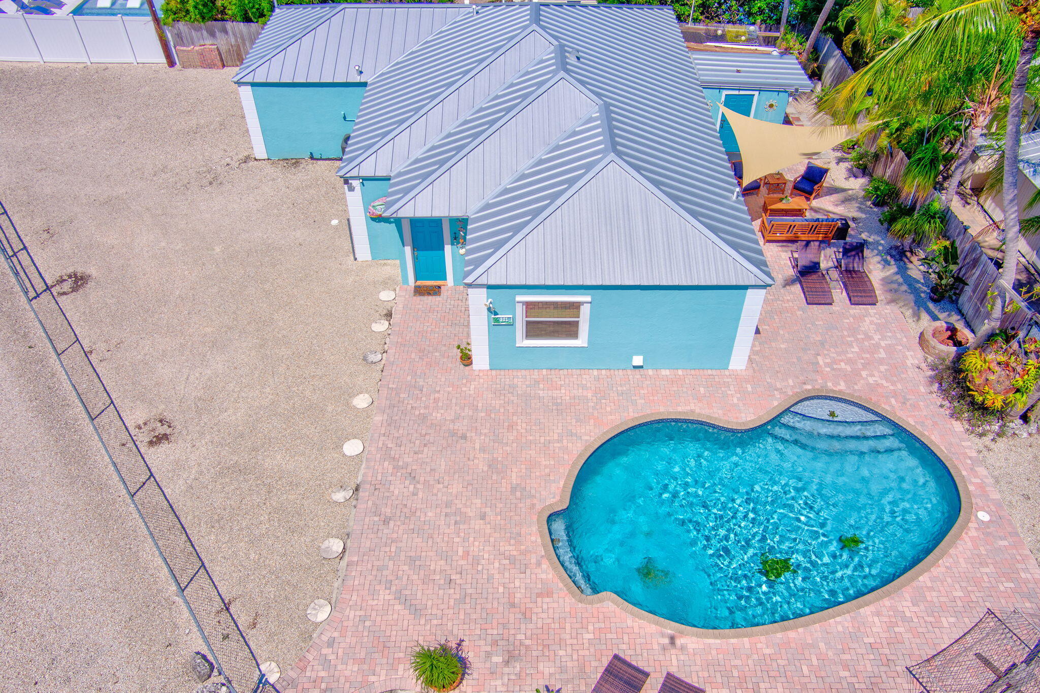 321 3rd Road Key Largo, FL 33037 - Photo 8 of 45 an aerial view of a house