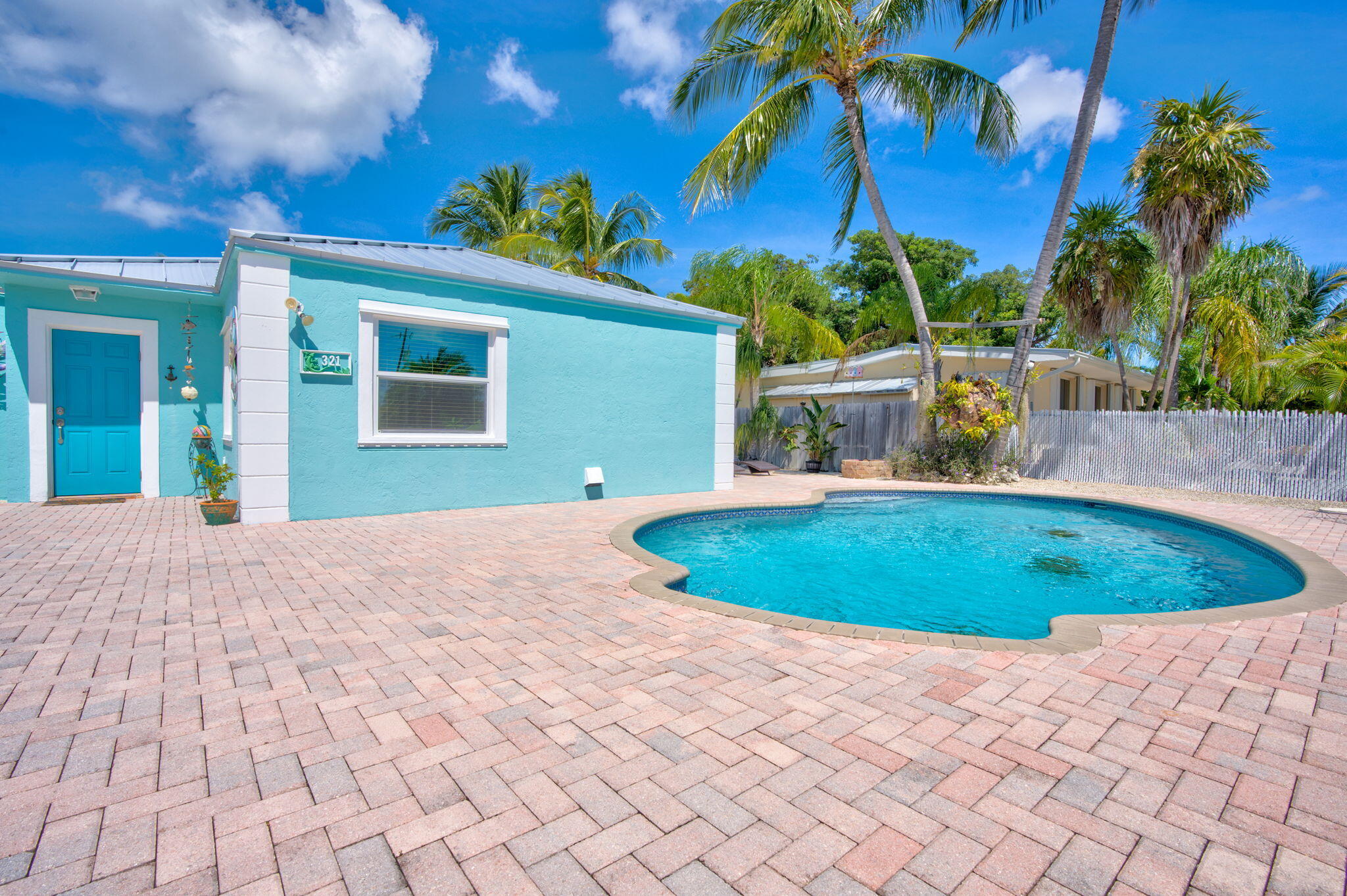 321 3rd Road Key Largo, FL 33037 - Photo 9 of 45 a view of a backyard
