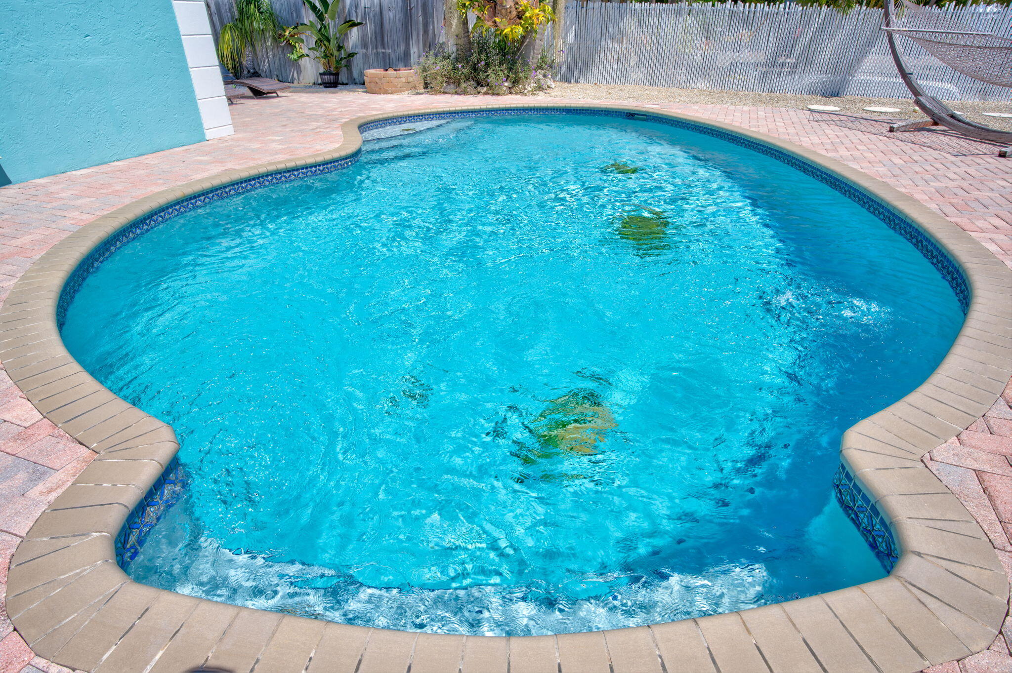 321 3rd Road Key Largo, FL 33037 - Photo 10 of 45 a view of a swimming pool with a yard