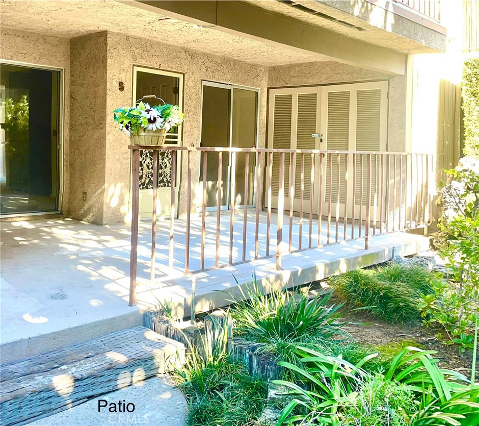 1161 West Duarte Road, Unit 5 Arcadia, CA 91007 - Photo 3 of 3 a front view of a house with a garden
