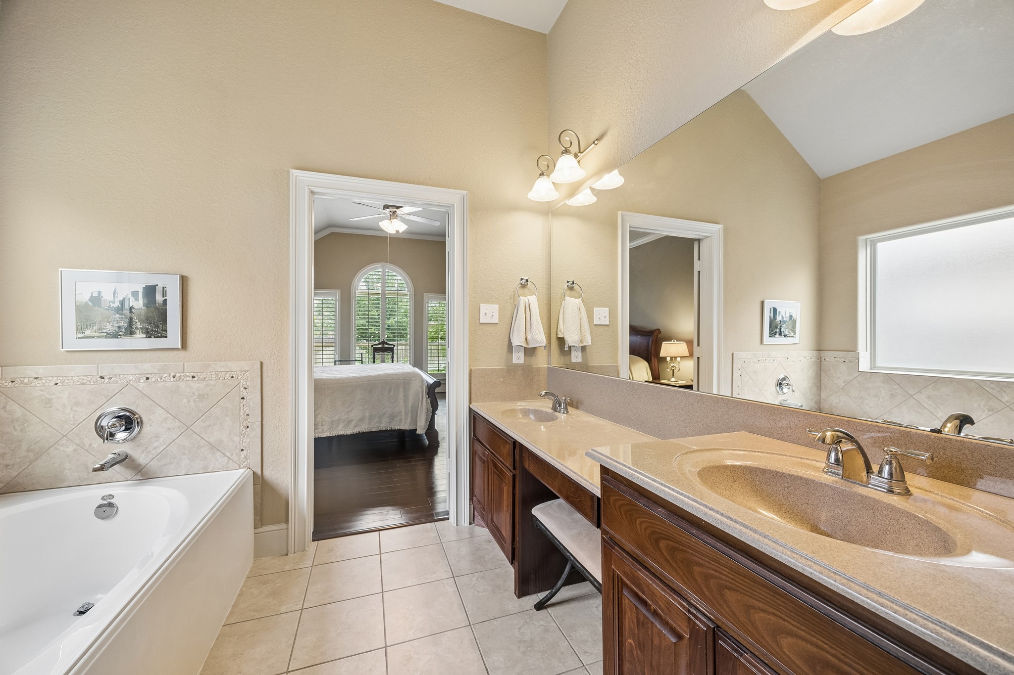 14 Tallgrass Way Spring, TX 77389 - Photo 21 of 31 Primary Bath featuring double sinks and a sit down powder area