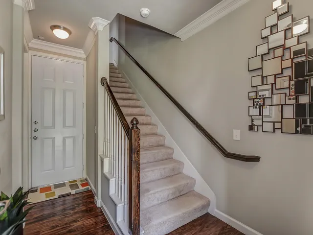 a view of a hallway with staircase