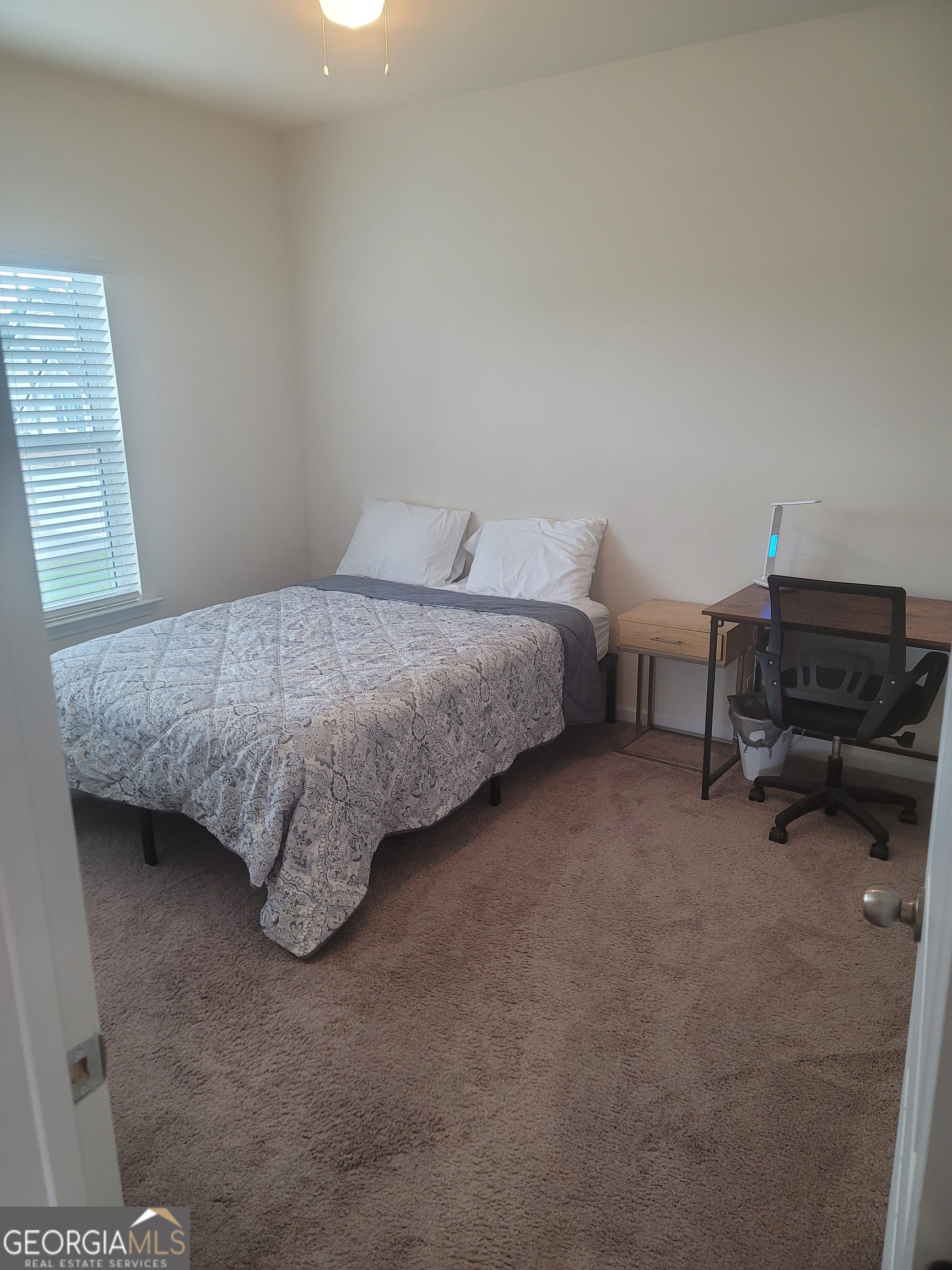 102 Potters Fields Northwest Cartersville, GA 30121 - Photo 26 of 36 a bedroom with bed and a window