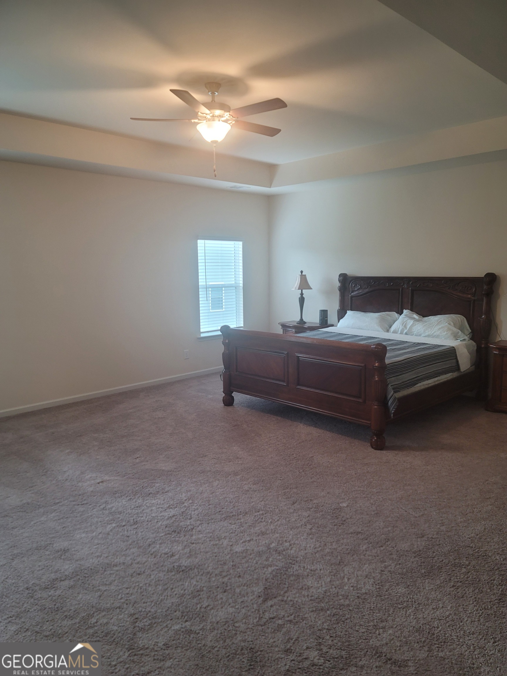 102 Potters Fields Northwest Cartersville, GA 30121 - Photo 28 of 36 a bedroom with a bed and a window