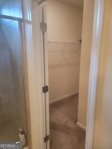 a view of a walk in closet
