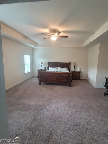 a view of backyard with pool table and chairs