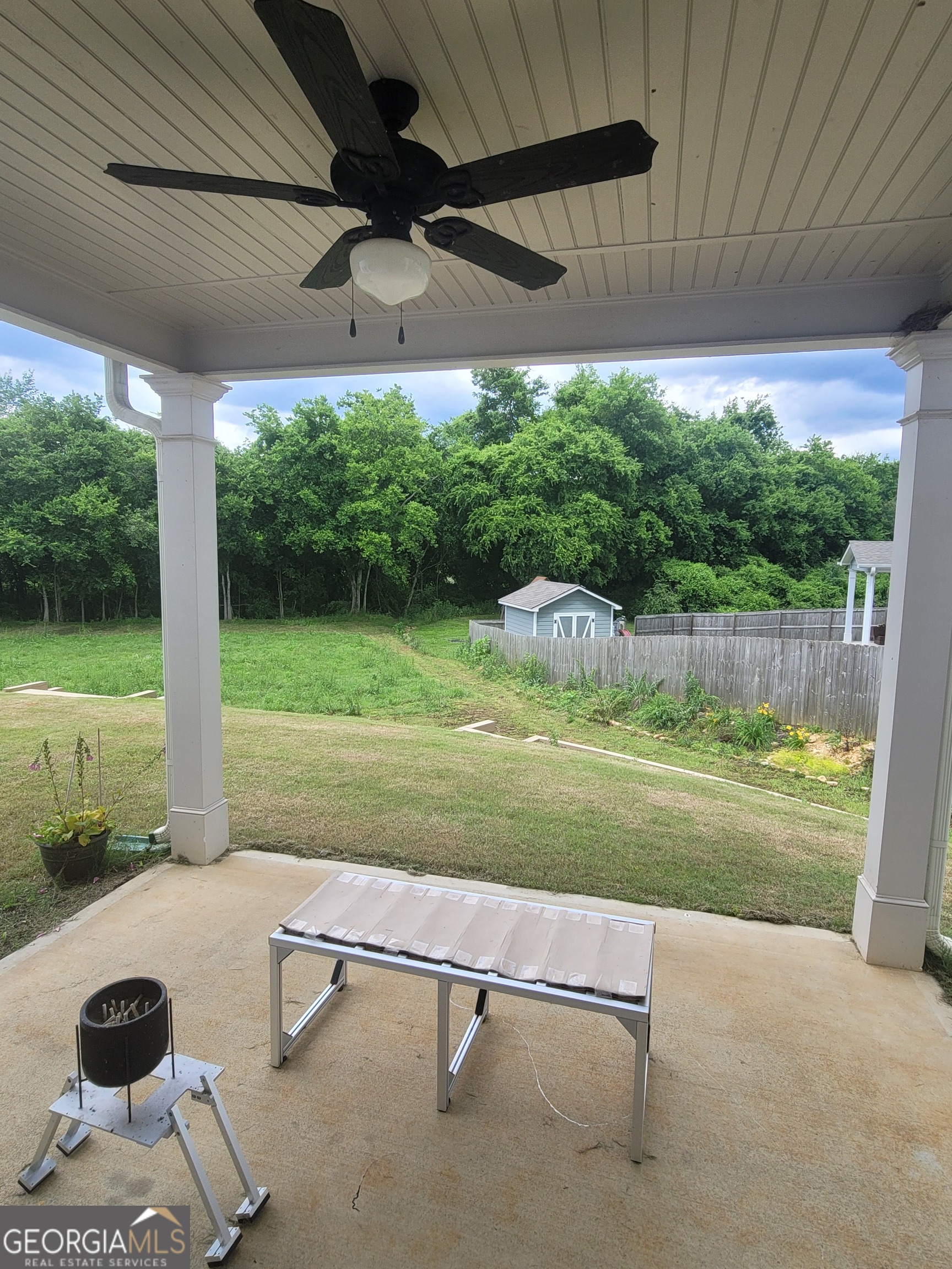 102 Potters Fields Northwest Cartersville, GA 30121 - Photo 36 of 36 a view of backyard with pool table and chairs