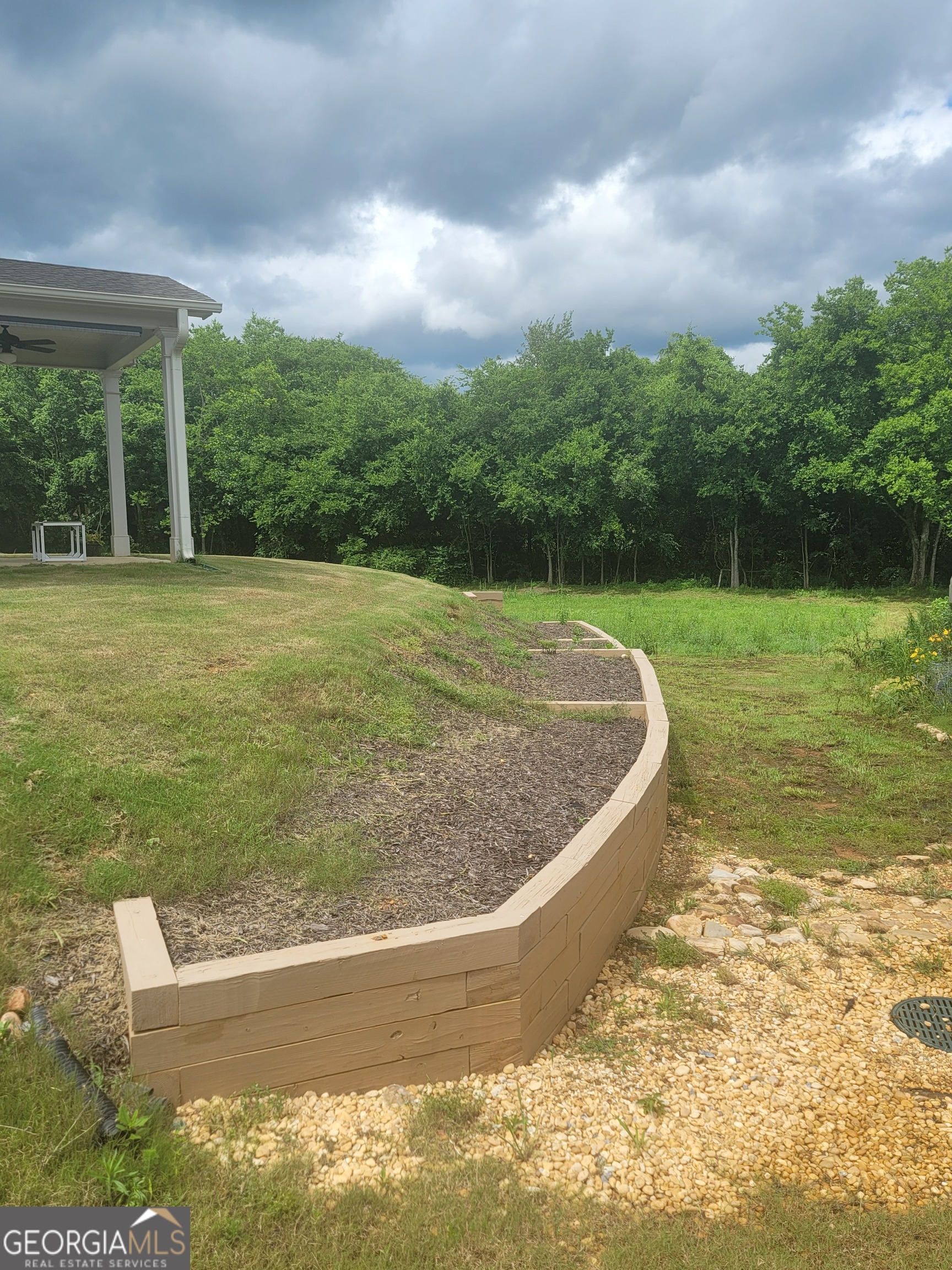 102 Potters Fields Northwest Cartersville, GA 30121 - Photo 4 of 36 a view of a swimming pool with a yard