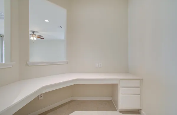 a view of a room with an entryway